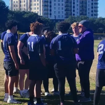 Coach Talking with Players